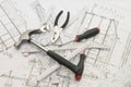 Building tools on the house plan Royalty Free Stock Photo