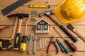 Building tools and supplies on wooden table for construction Royalty Free Stock Photo