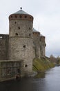 The building of the towers of the medieval Olavinlinna castle in a cloudy day. Finland