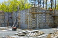 Building under construction interior skeleton of metal of formwork prepared for pouring the foundation Royalty Free Stock Photo