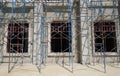 Building under construction with scaffold in front Royalty Free Stock Photo