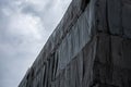 Building under construction with scaffolding and protective net is covered the building for safety and prevention dust Royalty Free Stock Photo