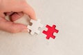 Close-Up White Jigsaw Pattern Puzzle Pieces To Be Connected With Missing Last Piece Positioned On A Flat Lay Background With Royalty Free Stock Photo