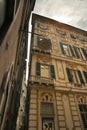 Building and very narrow street in the historic center of Genoa city Royalty Free Stock Photo