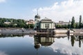 Building of Vodni elektrarna on Stvanice isle reflecting on Vltava river in Prague in Czech republic Royalty Free Stock Photo