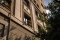 Building with windows and evening sun light and shadows. Sunset in the city Barcelona, Spain Royalty Free Stock Photo