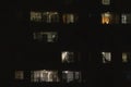 Building windows at night in the city of Medellin during quarantine. Stay home during the pandemic Royalty Free Stock Photo