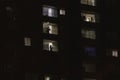 Building windows at night in the city of Medellin during quarantine. Stay home during the pandemic Royalty Free Stock Photo