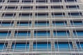 Building windows with square lines in the form of a lattice geometric architectural forms of the facade Royalty Free Stock Photo