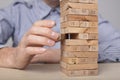 Building wood block tower. Business strategy, decisions and management concept Royalty Free Stock Photo