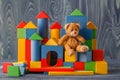 Building from wooden colourful childrens blocks Royalty Free Stock Photo