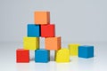 Building from wooden colourful childrens blocks Royalty Free Stock Photo