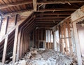 Building work underway in a suburban Edwardian house in Pinner, northwest London UK. The builder is taking the house back to brick