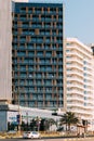 Building Of Wyndham Garden Corniche hotel In Sunny Day. Urban Architecture Of UAE Resort Town Of Ajman