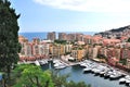 yachts port in front of buildings beside the sea