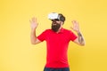 Building your visions. Creating reality. Man play game in VR glasses. Hipster with virtual reality headset. Explore