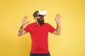 Building your visions. Creating reality. Man play game in VR glasses. Hipster with virtual reality headset. Explore