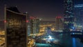 Buildings on Al Reem island in Abu Dhabi night timelapse from above. Royalty Free Stock Photo