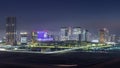 Buildings on Al Reem island in Abu Dhabi night timelapse from above. Royalty Free Stock Photo