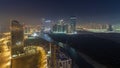 Buildings on Al Reem island in Abu Dhabi night timelapse from above. Royalty Free Stock Photo