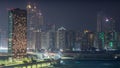 Buildings on Al Reem island in Abu Dhabi night timelapse from above. Royalty Free Stock Photo
