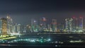 Buildings on Al Reem island in Abu Dhabi night timelapse from above. Royalty Free Stock Photo