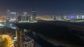 Buildings on Al Reem island in Abu Dhabi night timelapse from above. Royalty Free Stock Photo