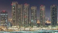 Buildings on Al Reem island in Abu Dhabi night timelapse from above. Royalty Free Stock Photo