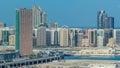 Buildings on Al Reem island in Abu Dhabi timelapse from above. Royalty Free Stock Photo