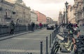 Canal embankment in Saint Petersburg, Church of the Savior on spilled blood, people walking, Bicycle Parking