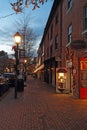 Buildings along King Street in Alexandria, Virginia at night vertical Royalty Free Stock Photo