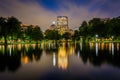 Buildings in Back Bay and the lake at the Public Garden at night Royalty Free Stock Photo