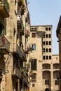 Buildings with balconies and the cathedral tower in old Barcelona, Catalunia, Spain Royalty Free Stock Photo