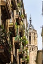 Buildings with balconies and the cathedral tower in old Barcelona, Catalunia, Spain Royalty Free Stock Photo