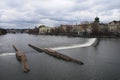 Buildings and bridge on other side of river vltava Royalty Free Stock Photo