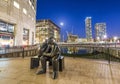 Buildings of Canary Wharf at night in London. View from the street Royalty Free Stock Photo