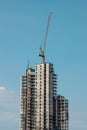 Buildings and crane construction site with blue sky Royalty Free Stock Photo