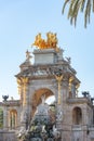 Buildings decorated with stucco and statues against the blue sky and white clouds. On the streets in Catalonia, public places