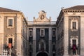 Buildings in the downtown of Catania, with gate called `Porta Uzeda` Royalty Free Stock Photo