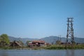 Buildings and electricity poles by the canals of Inle Lake Royalty Free Stock Photo