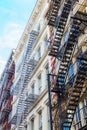 Buildings with fire escape stairs in Soho, NYC Royalty Free Stock Photo