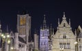 Buildings in the Graslei, quay in the promenade next to river Lys in Ghent, Belgium and St Michael`s Bridge at dusk. Royalty Free Stock Photo