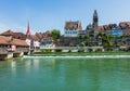 Buildings of the Swiss town of Bremgarten along the Reuss river Royalty Free Stock Photo