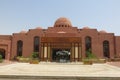 Buildings in a hotel complex in Egyptian style. Arabic architecture in Marsa Alam. Hotel rooms in buildings with ocher plaster. Royalty Free Stock Photo