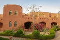 Buildings in a hotel complex in Egyptian style. Arabic architecture in Marsa Alam. Hotel rooms in buildings with ocher plaster. Royalty Free Stock Photo