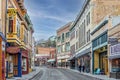 Buildings lining Main Street on a clear day at the edge of Bisbee, Arizona Royalty Free Stock Photo