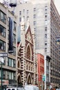 Buildings located along West 37th Street at Broadway, Manhattan, including the iconic Roman Catholic Church of the Holy Innocents