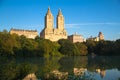 Buildings in Manhattan reflects on the lake at Central Park with blue sky Royalty Free Stock Photo