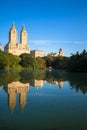 Buildings in Manhattan reflects on the lake at Central Park with blue sky Royalty Free Stock Photo