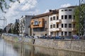 Buildings mirrored in the Somes River on August 21, 2018 in Cluj-Napoca